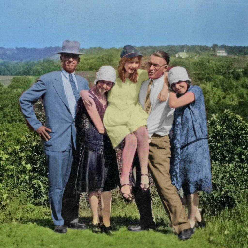 A group of four people holding up a young woman. From the Rognlie papers.